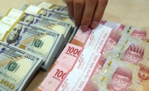 Rupiah Dibuka Melemah Tipis di Rp14.095/USD